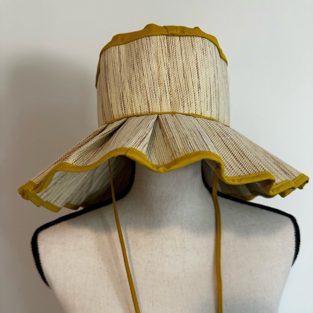 Asian inspired foldable straw hat yellow trim